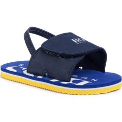 BOSS-J09123 849 NAVY S. Niebieskie sandały chłopięce Boss, z tworzywa sztucznego, bez zapięcia. Za 139,00 zł.
