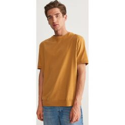 T-shirt z bawełny organicznej - Żółty. Żółte t-shirty damskie Reserved, s, bez wzorów, z bawełny, bez kołnierzyka. Za 79,99 zł.