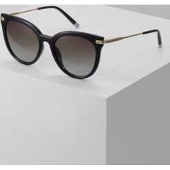 Calvin Klein Okulary przeciwsłoneczne black. Czarne okulary przeciwsłoneczne damskie aviatory Calvin Klein. W wyprzedaży za 503,20 zł.