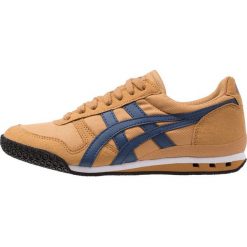 Onitsuka Tiger ULTIMATE 81 Sneakersy niskie caravan/midnight blue. Pomarańczowe trampki i tenisówki damskie marki Onitsuka Tiger, z tworzywa sztucznego. Za 359,00 zł.