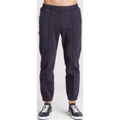 SPODNIE Emporio Armani. Niebieskie spodnie męskie Emporio Armani, na imprezę, m, z aplikacjami, z elastanu. Za 495,00 zł.