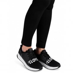 Buty sportowe damskie Ideal Shoes X-9703 Czarne. Czarne buty sportowe damskie Ideal Shoes, bez wzorów, z tworzywa sztucznego, sportowe. Za 64,00 zł.