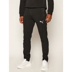 Spodnie dresowe Puma Evostripe 583469. Szare jeansy męskie Puma, m, bez wzorów. Za 269,99 zł.