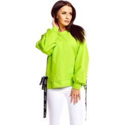 Bluza z ozdobną taśmą w pasie zielony. Zielone bluzy damskie N/A, xs, bez wzorów, z bawełny, bez rękawów, bez kaptura. Za 118,07 zł.