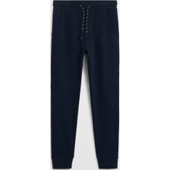Mango Kids - Spodnie dziecięce Jumbo 110-164 cm. Czarne spodnie chłopięce Mango Kids, bez wzorów, z bawełny. Za 69,90 zł.
