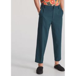 Spodnie z Tencelu™ - Turkusowy. Niebieskie spodnie męskie Reserved, s, bez wzorów. Za 199,99 zł.