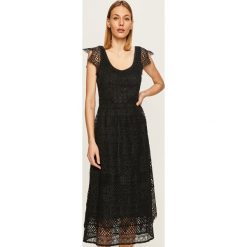 Tommy Hilfiger - Sukienka. Niebieskie sukienki damskie TOMMY HILFIGER, do pracy, bez wzorów, z bawełny, biznesowe, z okrągłym kołnierzem, bez rękawów, midi, rozkloszowane. W wyprzedaży za 729,90 zł.