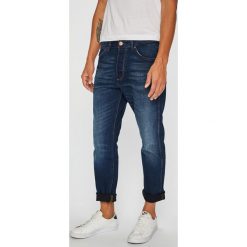 Wrangler - Jeansy Slider. Niebieskie jeansy męskie Wrangler, bez wzorów. W wyprzedaży za 219,90 zł.