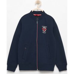 Bluza ze stójką - Granatowy. Niebieskie bluzy chłopięce marki Reserved, l. W wyprzedaży za 59,99 zł.