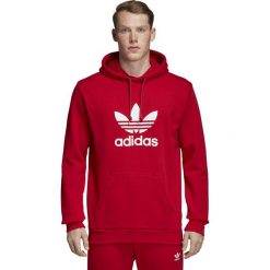 MĘSKA BLUZA ADIDAS ORIGINALS TREFOIL (M). Czerwone bluzy męskie Adidas, m, bez wzorów, z bawełny, klasyczne, z kapturem, bez rękawów, bez kaptura. W wyprzedaży za 259,99 zł.