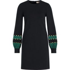 Sukienka dzianinowa Tory Burch 57369. Czarne sukienki damskie Tory Burch, s, bez wzorów, z elastanu, bez kołnierzyka, bez rękawów. W wyprzedaży za 939,00 zł.