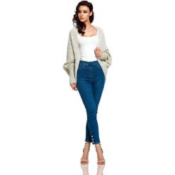 Sweter oversize kimonowy - Beżowy, Uniwersalny. Brązowe swetry damskie e-margeritka.pl, uniwersalny, bez wzorów, casualowe, bez rękawów, bez kaptura. Za 149,99 zł.