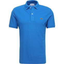 Lacoste SHORTSLEEVE SLIM FIT Koszulka polo royal. Niebieskie koszulki męskie Lacoste, s, bez wzorów, z bawełny, polo, bez rękawów. Za 379,00 zł.