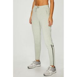 Adidas Performance - Spodnie. Zielone spodnie sportowe damskie marki adidas Performance, s, z poliesteru. W wyprzedaży za 259,90 zł.