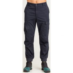 SPODNIE Armani Exchange. Niebieskie spodnie męskie Armani Exchange, na imprezę, m, z aplikacjami, z elastanu. Za 365,40 zł.