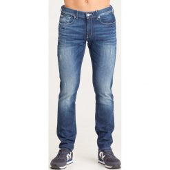 JEANSY SLIM FIT Armani Exchange. Niebieskie jeansy męskie Armani Exchange, m, z aplikacjami. Za 335,40 zł.