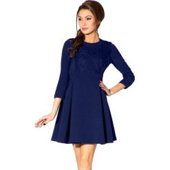 Sukienka w kolorze granatowym. Niebieskie sukienki damskie Far Far Fashion, Ryłko by Agnes&Paul, bez wzorów, z okrągłym kołnierzem, bez rękawów, rozkloszowane. W wyprzedaży za 69,95 zł.