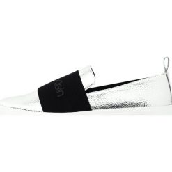 Calvin Klein JACINTA Półbuty wsuwane silver. Szare półbuty damskie wsuwane Calvin Klein, bez wzorów, ze skóry ekologicznej, na niskim obcasie, bez zapięcia. Za 619,00 zł.