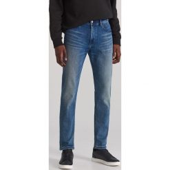 Jeansowe spodnie high flex - Niebieski. Niebieskie spodnie męskie Reserved, m, z jeansu. Za 149,99 zł.