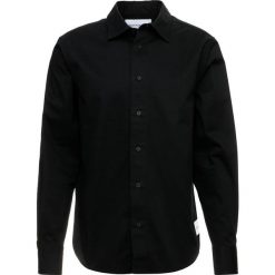 Calvin Klein Jeans INSTITUTIONAL LOGO Koszula black. Czarne koszule męskie jeansowe Calvin Klein Jeans, m. Za 419,00 zł.