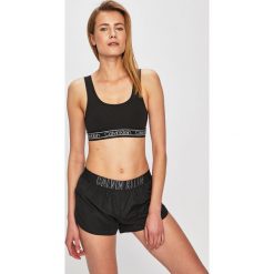 Calvin Klein Underwear - Biustonosz sportowy. Różowe biustonosze sportowe damskie Calvin Klein Underwear, s, bez wzorów, z elastanu. W wyprzedaży za 99,90 zł.