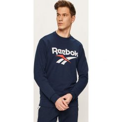 Reebok Classic - Bluza. Niebieskie bluzy męskie Reebok Classic, xl, z nadrukiem, z elastanu, z okrągłym kołnierzem, bez rękawów, bez kaptura. W wyprzedaży za 179,90 zł.