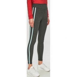 New Balance - Legginsy. Szare spodnie damskie New Balance, s, z elastanu. W wyprzedaży za 119,90 zł.