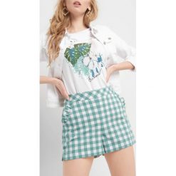 Szorty z wysokim stanem. Brązowe szorty damskie Orsay, bez wzorów, z elastanu, eleganckie, z podwyższonym stanem. Za 79,99 zł.