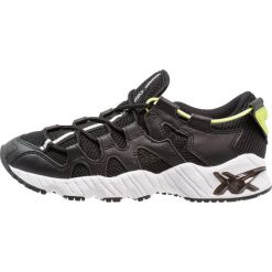 Asics Tiger GELMAI Tenisówki i Trampki black. Czarne tenisówki damskie Asics Tiger, z tworzywa sztucznego. W wyprzedaży za 384,30 zł.