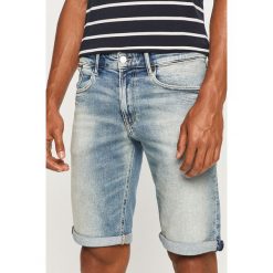 Tommy Jeans - Szorty jeansowe. Niebieskie spodenki i szorty męskie Tommy Jeans, bez wzorów, z bawełny, casualowe. Za 299,90 zł.