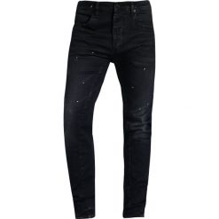 Cristiano Ronaldo CR7 Jeansy Slim Fit navy resin. Niebieskie jeansy męskie relaxed fit marki Cristiano Ronaldo CR7. W wyprzedaży za 377,10 zł.