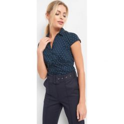 Taliowana koszula ze wzorem. Niebieskie bluzki damskie Orsay, bez wzorów, z elastanu, eleganckie, bez kołnierzyka, z krótkim rękawem. Za 79,99 zł.