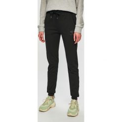 Hummel - Spodnie sportowe. Szare spodnie damskie Hummel, s, bez wzorów, z bawełny. W wyprzedaży za 139,90 zł.