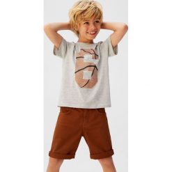 Mango Kids - T-shirt Six 110-164 cm. Szare t-shirty chłopięce Mango Kids, z nadrukiem, z bawełny, bez rękawów. Za 35,90 zł.