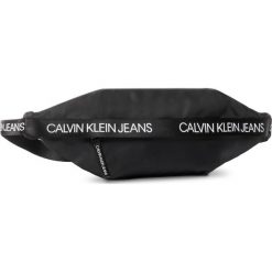 Saszetka nerka CALVIN KLEIN JEANS - Log Waistpack U0IU00100 BAE. Czarne nerki damskie Calvin Klein Jeans, bez wzorów, z jeansu, młodzieżowe, bez dodatków. Za 179,00 zł.