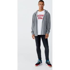 Czarne jeansy super skinny fit z efektem zużycia. Czarne jeansy męskie marki Pull&Bear, m, bez wzorów. Za 89,90 zł.