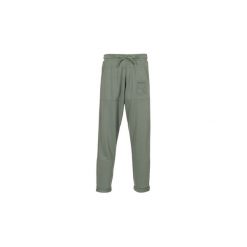 Spodnie treningowe Puma ARCH FASHION PANTS. Szare spodnie męskie Puma, s, bez wzorów. Za 188,30 zł.