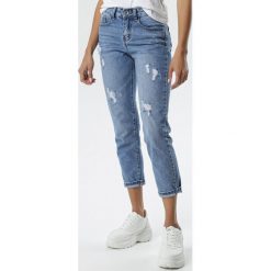 Niebieskie Jeansy Lakeisha. Niebieskie jeansy damskie Born2be, s, bez wzorów, z jeansu, z podwyższonym stanem. Za 109,99 zł.