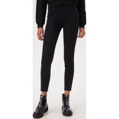 Jeansy skinny z lampasami - Czarny. Czarne jeansy damskie Sinsay. Za 69,99 zł.