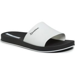 Klapki IPANEMA - Slide Unissex 82832 Black/White 20829. Białe klapki damskie Ipanema, bez wzorów, z tworzywa sztucznego, bez obcasa. Za 99,99 zł.