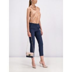 Bluzka Marella 31161498200. Pomarańczowe bluzki damskie Marella, bez wzorów, z jedwabiu, bez kołnierzyka, bez rękawów. W wyprzedaży za 329,00 zł.