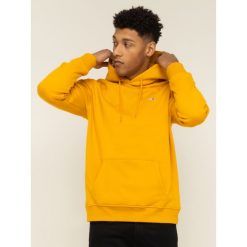 Bluza Tommy Jeans Tjm Tommy Classics DM0DM07199. Żółte bluzy męskie Tommy Jeans, m, bez wzorów, z bawełny, bez kołnierzyka, bez rękawów, bez kaptura. Za 379,00 zł.