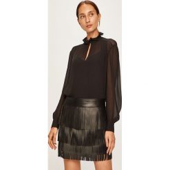 Calvin Klein - Bluzka. Czarne bluzki damskie Calvin Klein, bez wzorów, z poliesteru, ze stójką, bez rękawów. W wyprzedaży za 699,90 zł.