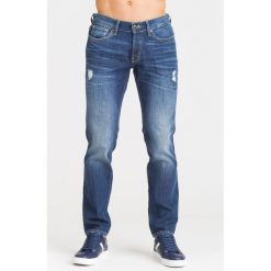 NIEBIESKIE JEANSY SONNY GUESS Z PRZETARCIAMI. Niebieskie jeansy męskie Guess, m, z aplikacjami. Za 199,50 zł.