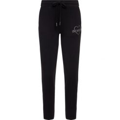 Spodnie dresowe LOVE MOSCHINO W151301E 1958. Szare spodnie damskie Love Moschino, z elastanu. W wyprzedaży za 359,00 zł.