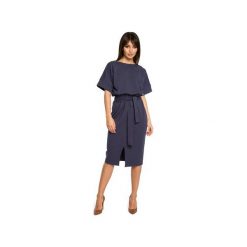 B062 Dzianinowa sukienka z rozcięciem. Żółte sukienki damskie BE, na imprezę, xl, bez wzorów, z dzianiny, eleganckie, bez kołnierzyka, bez rękawów, ołówkowe. Za 149,00 zł.
