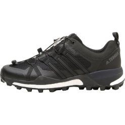 Adidas Performance TERREX SKYCHASER GTX Obuwie hikingowe core black/carbon. Czarne buty sportowe męskie adidas Performance, z tworzywa sztucznego, bez zapięcia, outdoorowe. Za 749,00 zł.