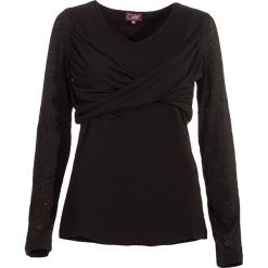 Koszulka w kolorze czarnym. Czarne koszulki damskie Coline, m, w koronkowe wzory, z bawełny, z okrągłym kołnierzem. W wyprzedaży za 49,95 zł.