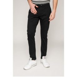 Produkt by Jack & Jones - Spodnie. Czarne spodnie męskie PRODUKT by Jack & Jones, na co dzień, l, bez wzorów, z elastanu, casualowe. W wyprzedaży za 69,90 zł.