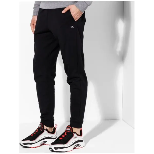 Calvin Klein Spodnie Knit , czarny, rozmiar L. Czarne spodnie męskie Calvin Klein, na co dzień, s, bez wzorów, z bawełny, sportowe. W wyprzedaży za 279,99 zł.